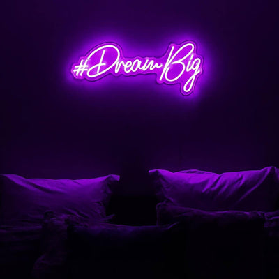 purple dream big neon sign above bed in bedroom