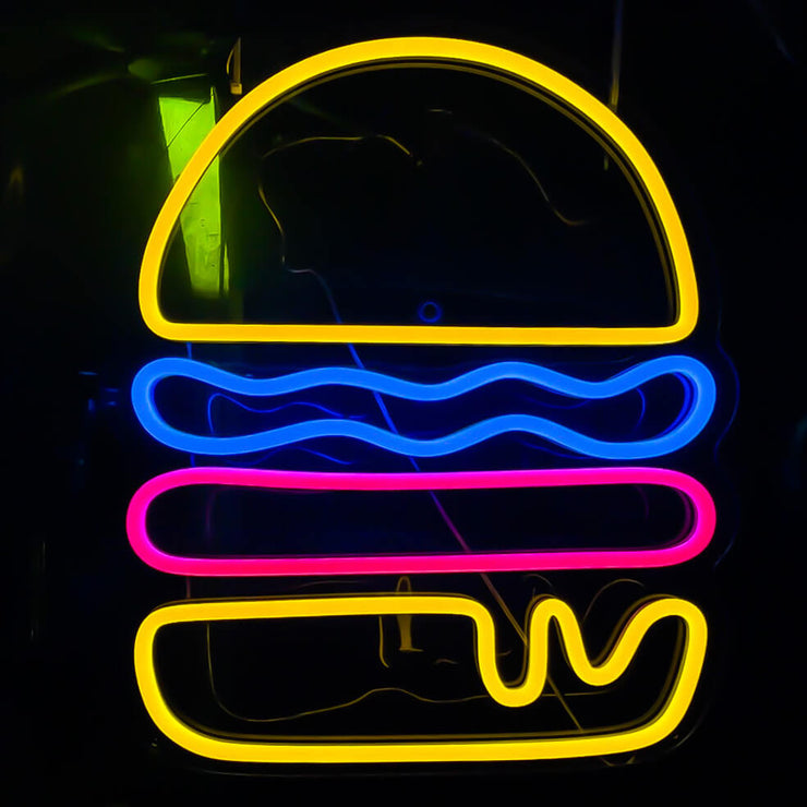 multi coloured burger neon sign at outdoor night event