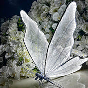 white led butterfly placed on floor with flower backdrop