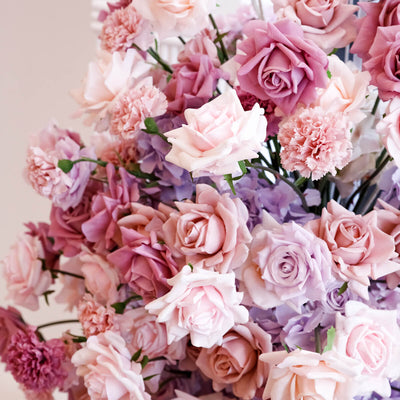 mixed pink and lilac rose flower arrangement