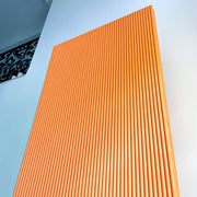 orange slatted rectangle backdrop board