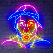 multicoloured tupac neon sign hanging on bar wall