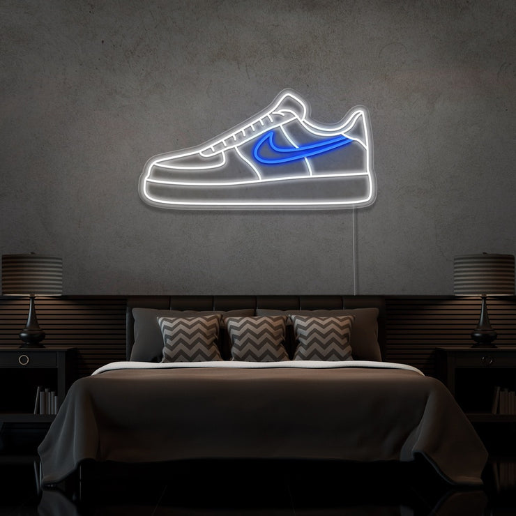 blue air force 1 nike sneaker neon sign hanging on bedroom wall