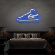 blue air jordan 1 sneaker neon sign hanging on bedroom wall
