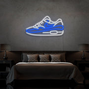 blue air max 1 sneaker neon sign hanging on bedroom wall