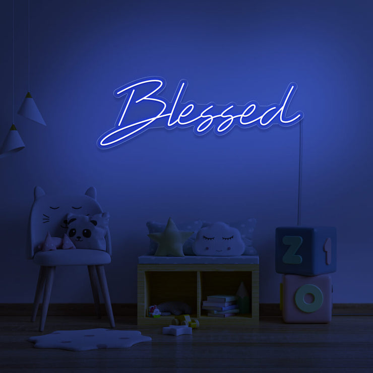 blue blessed neon sign hanging on kids bedroom wall