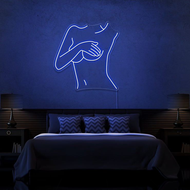 blue cover up neon sign hanging on bedroom wall