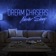 blue dream chasers never sleep neon sign hanging on living room wall
