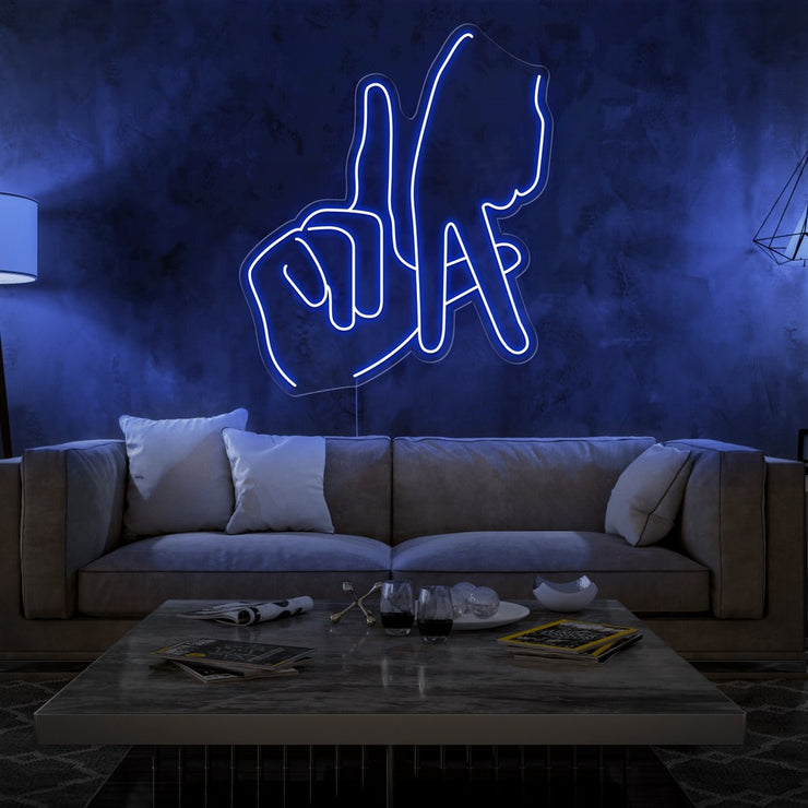 blue LA fingers neon sign hanging on living room wall