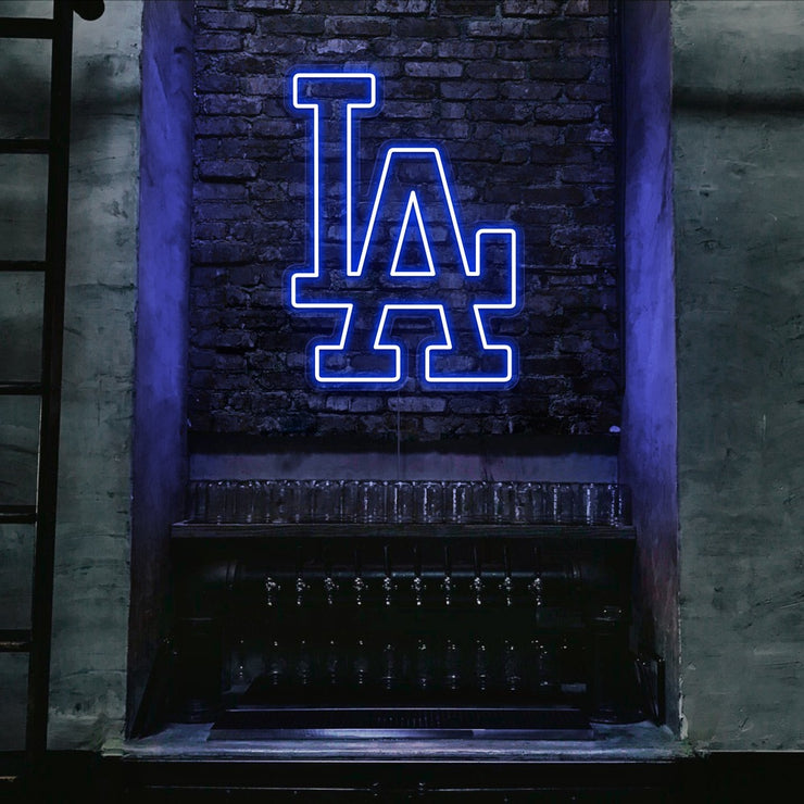 blue LA neon sign hanging on bar wall