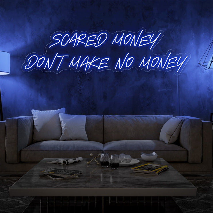 blue scared money dont make no money neon sign hanging on living room wall