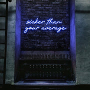 blue sicker than your average neon sign hanging on bar wall