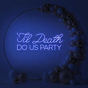 blue til death do us party neon sign in gold hoop backdrop with balloons
