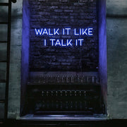 blue walk it like i talk it neon sign hanging on bar wall