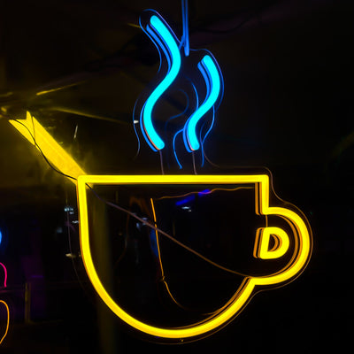 yellow and blue coffee cup neon sign