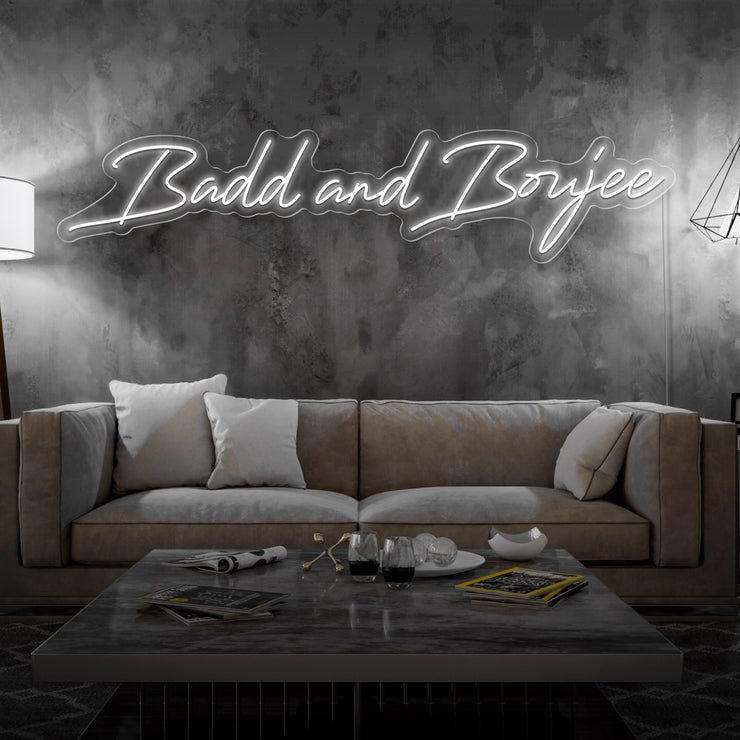 cod white bad and boujee neon sign hanging on living room wall