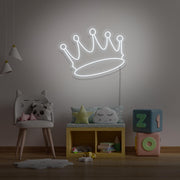cold white crown neon sign hanging on kids bedroom wall