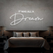 cold white it was all a dream neon sign hanging on bedroom wall