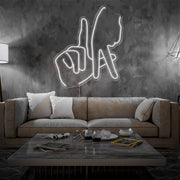 cold white LA fingers neon sign hanging on living room wall