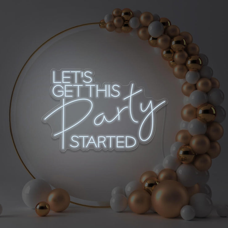 cold white lets get this party started neon sign hanging in gold hoop frame