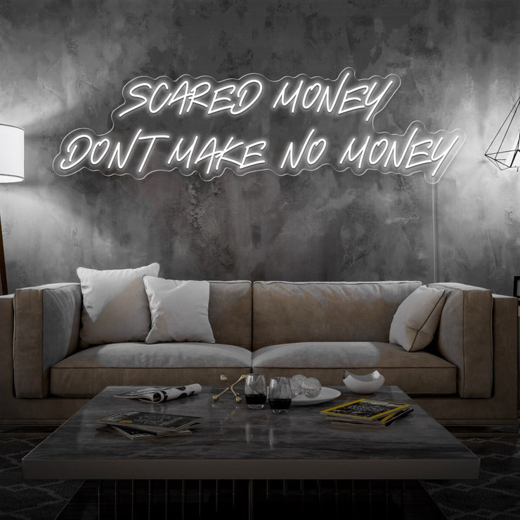 cold white scared money dont make no money neon sign hanging on living room wall