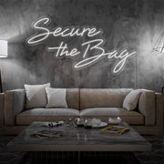 cold white secure the bag neon sign hanging on living room wall