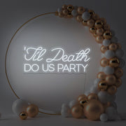 cold white til death do us party neon sign in gold hoop backdrop with balloons