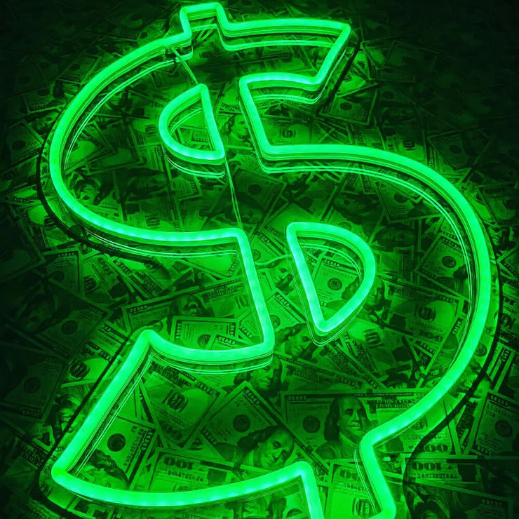 green dollar neon sign laying on bed of money