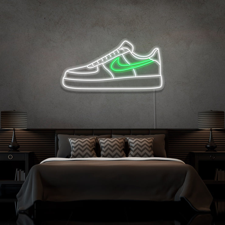 green air force 1 nike sneaker neon sign hanging on bedroom wall
