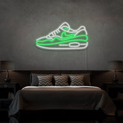 green air max 1 sneaker neon sign hanging on bedroom wall