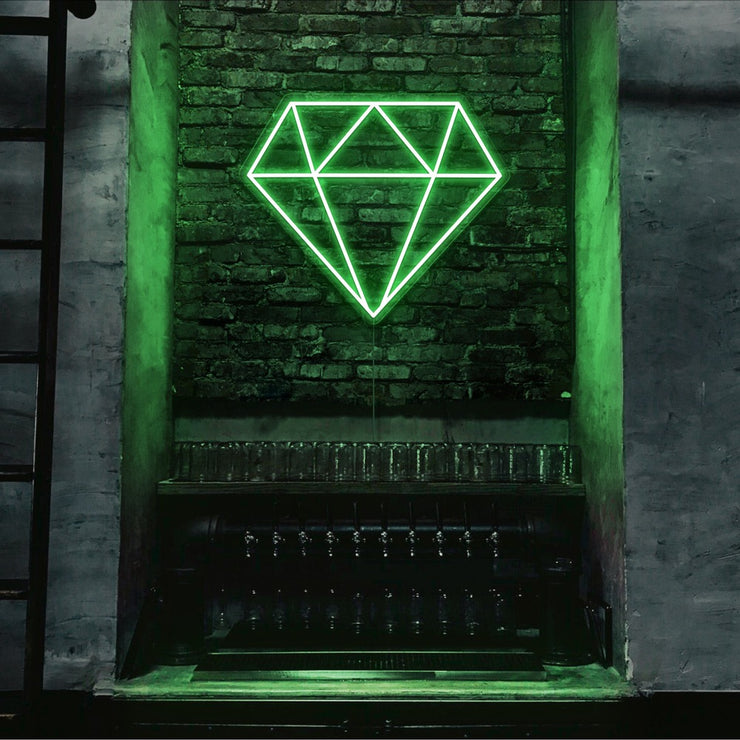 green diamond neon sign hanging on bar wall