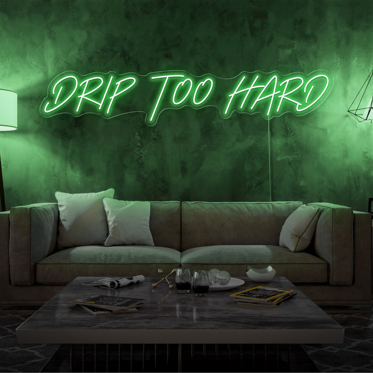 green drip too hard neon sign hanging on living room wall