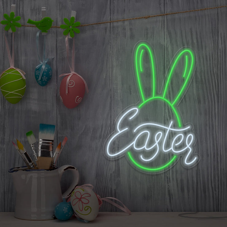 green easter bunny neon sign hanging on wall