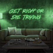 green get rich or die trying neon sign hanging  on living room wall