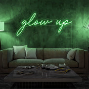 green glow up neon sign hanging on living room wall