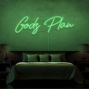 green gods plan neon sign hanging on bedroom wall