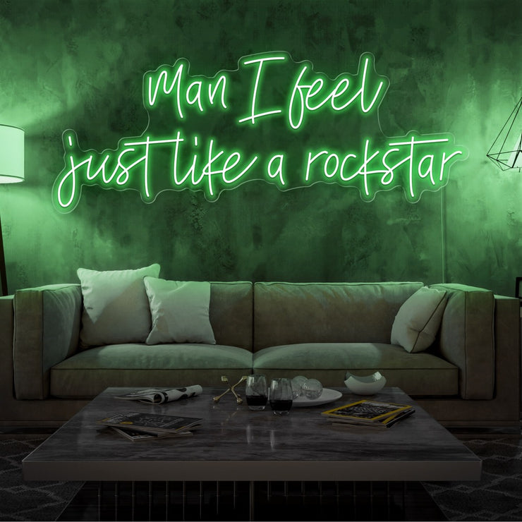 green man i feel just like a rockstar neon sign hanging on living room wall
