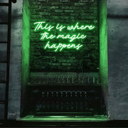 green this is where the magic happens neon sign hanging on bar wall