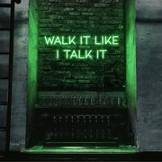 green walk it like i talk it neon sign hanging on bar wall
