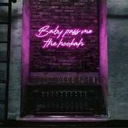 hot pink baby pass me the hookah neon sign hanging on bar wall