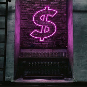 hot pink dollar neon sign hanging on bar wall