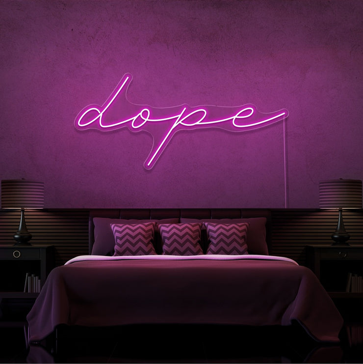 hot pink dope cursive neon sign hanging on bedroom wall
