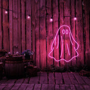 hot pink draped ghost neon sign hanging on timber wall
