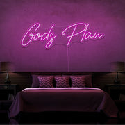 hot pink gods plan neon sign hanging on bedroom wall