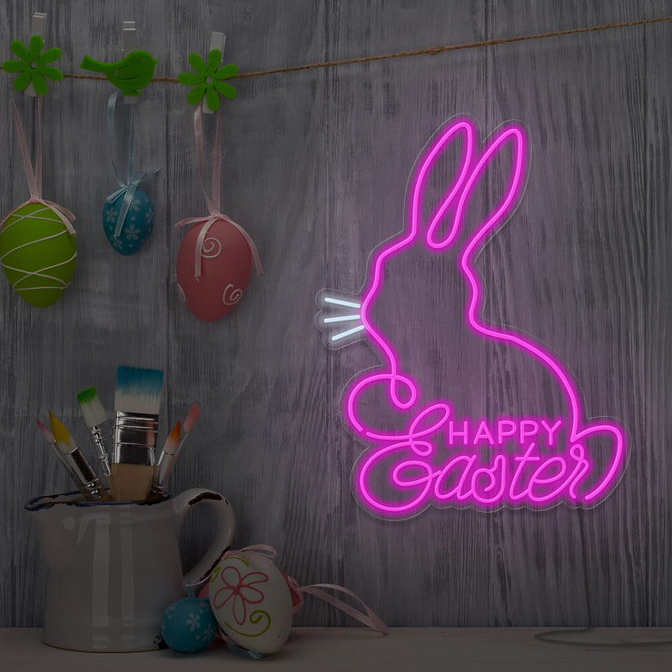 hot pink happy easter bunny neon sign hanging on wall