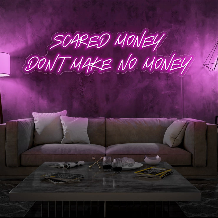 hot pink scared money dont make no money neon sign hanging on living room wall