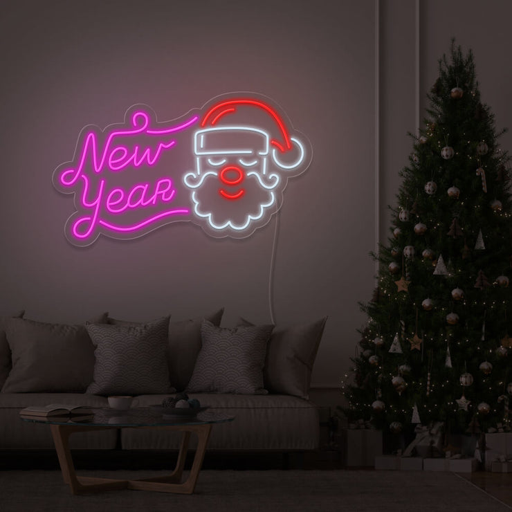 hot pink new year santa neon sign hanging on living room wall