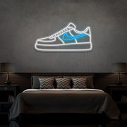 ice blue air force 1 nike sneaker neon sign hanging on bedroom wall