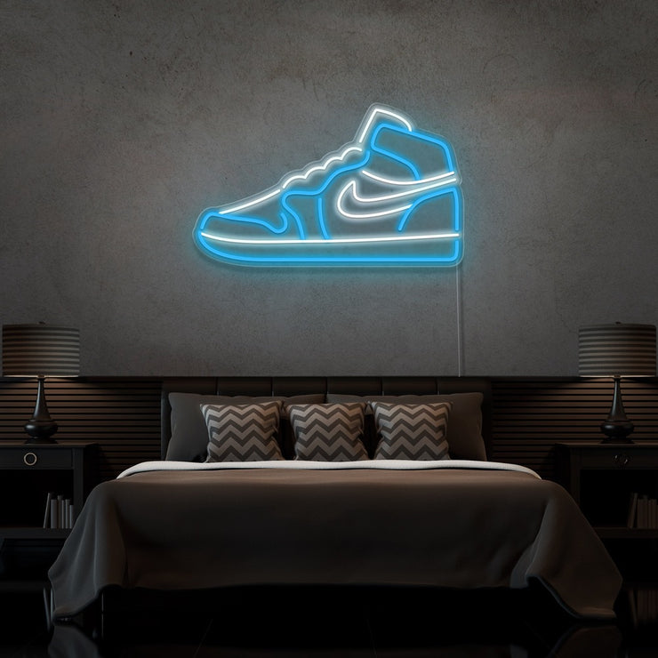 ice blue air jordan 1 sneaker neon sign hanging on bedroom wall