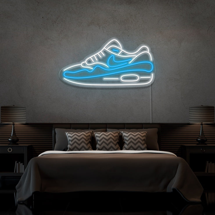 ice blue air max 1 sneaker neon sign hanging on bedroom wall